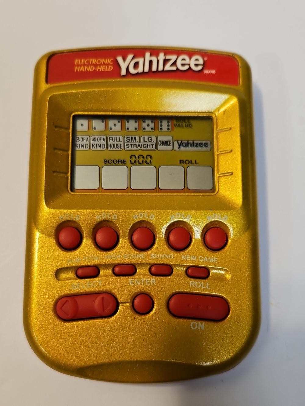 MILTON BRADLEY  YAHTZEE 2002, HANDHELD GAME RED AND GOLD. TESTED , WORKING